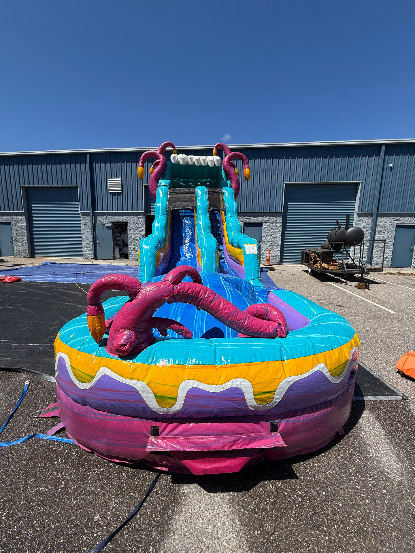Pink octopus themed water slide ready for delivery